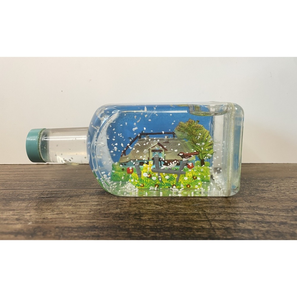 Vintage 5" Plastic Bottle Shape Snow Water Globe Cabin Woods Country 1881